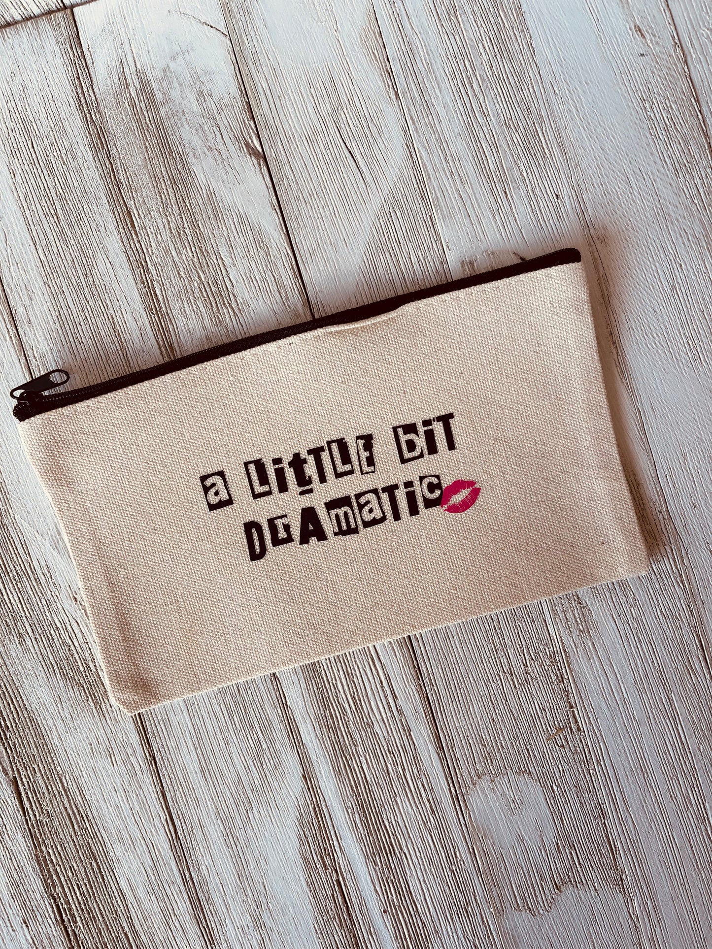 A little bit dramatic pouch bag