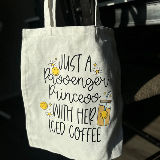 just a passenger princess with her iced coffee tote bag